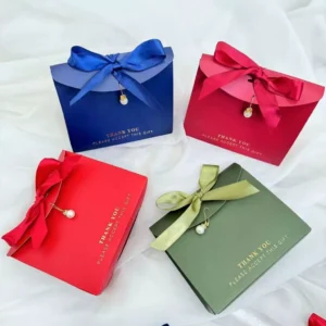 ถุงของขวัญผูกโบว์ สีน้ำเงิน แดง เขียว ขนาดเล็ก คละสี 12 ใบ
